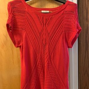 A red knit top